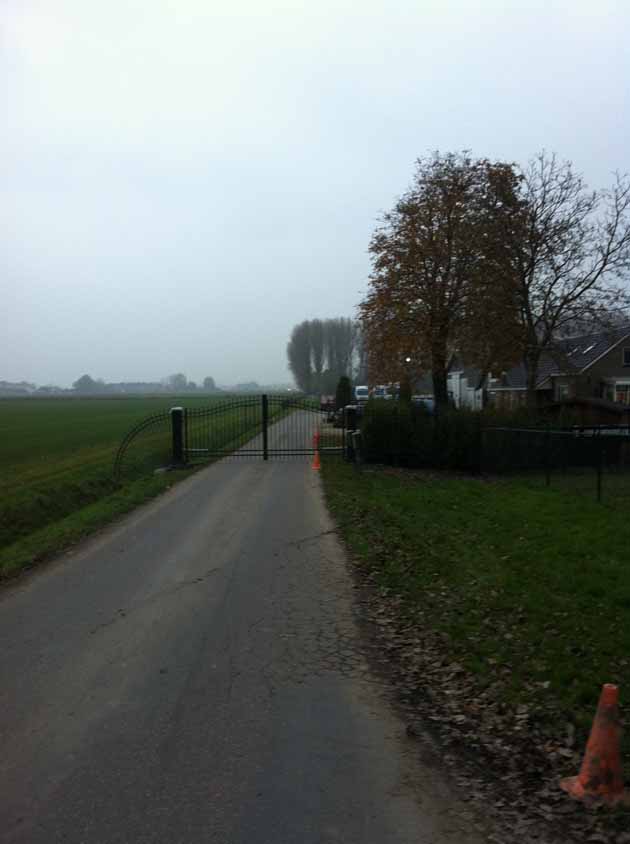 Sier draaipoort met sloothek Hoving Hekwerk B.V. Stadskanaal