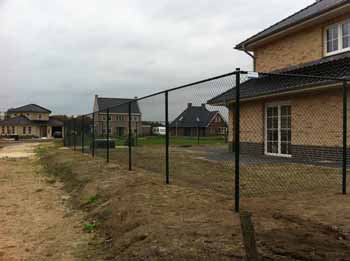 Gaashekwerk om woning Hoving Hekwerk B.V. Stadskanaal